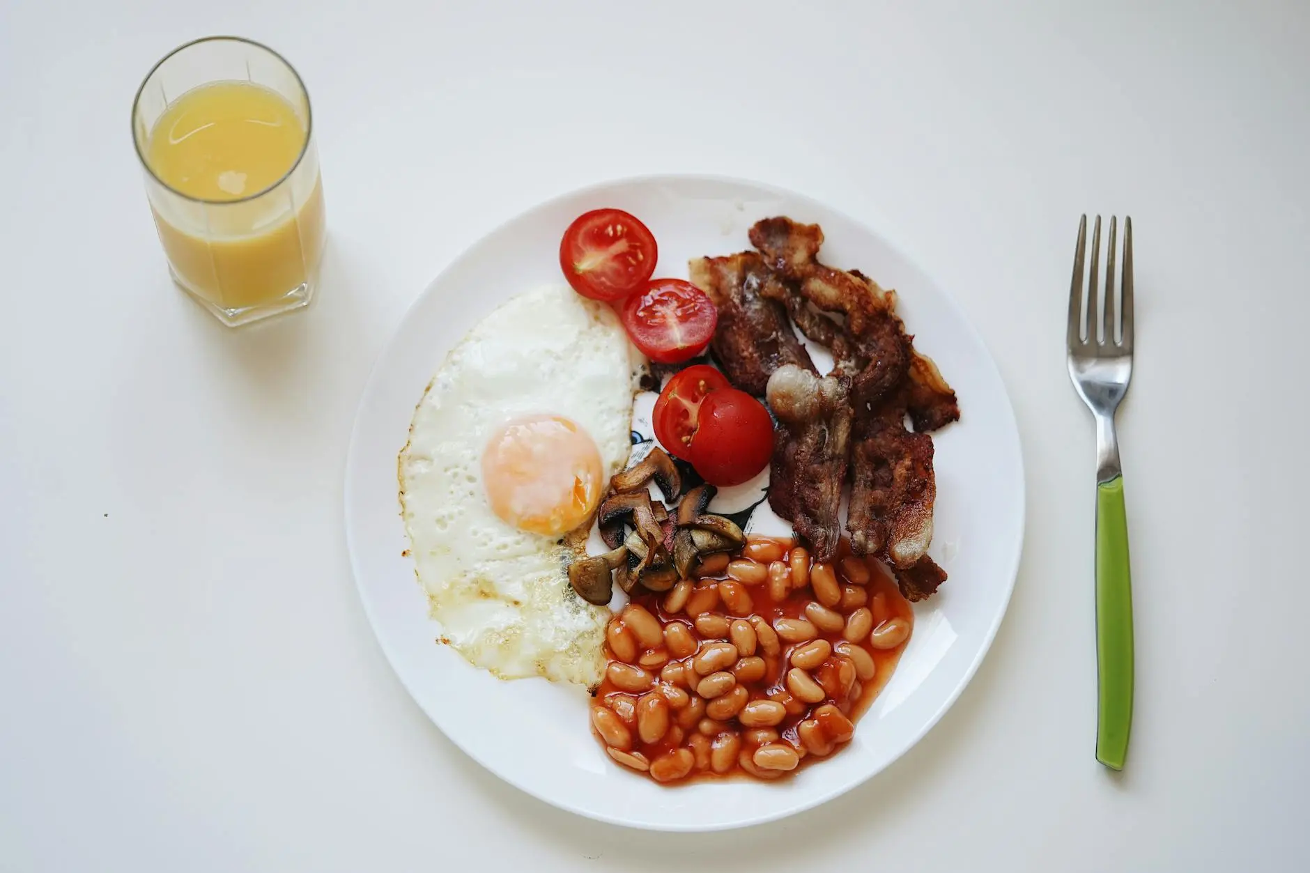 Simple Stovetop Baked Beans with Bacon A quick and hearty take on traditional baked beans that brings comfort food to your table in minutes