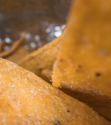 Melted dairy transformed into golden, gluten-free bites that add crunch to any spread.