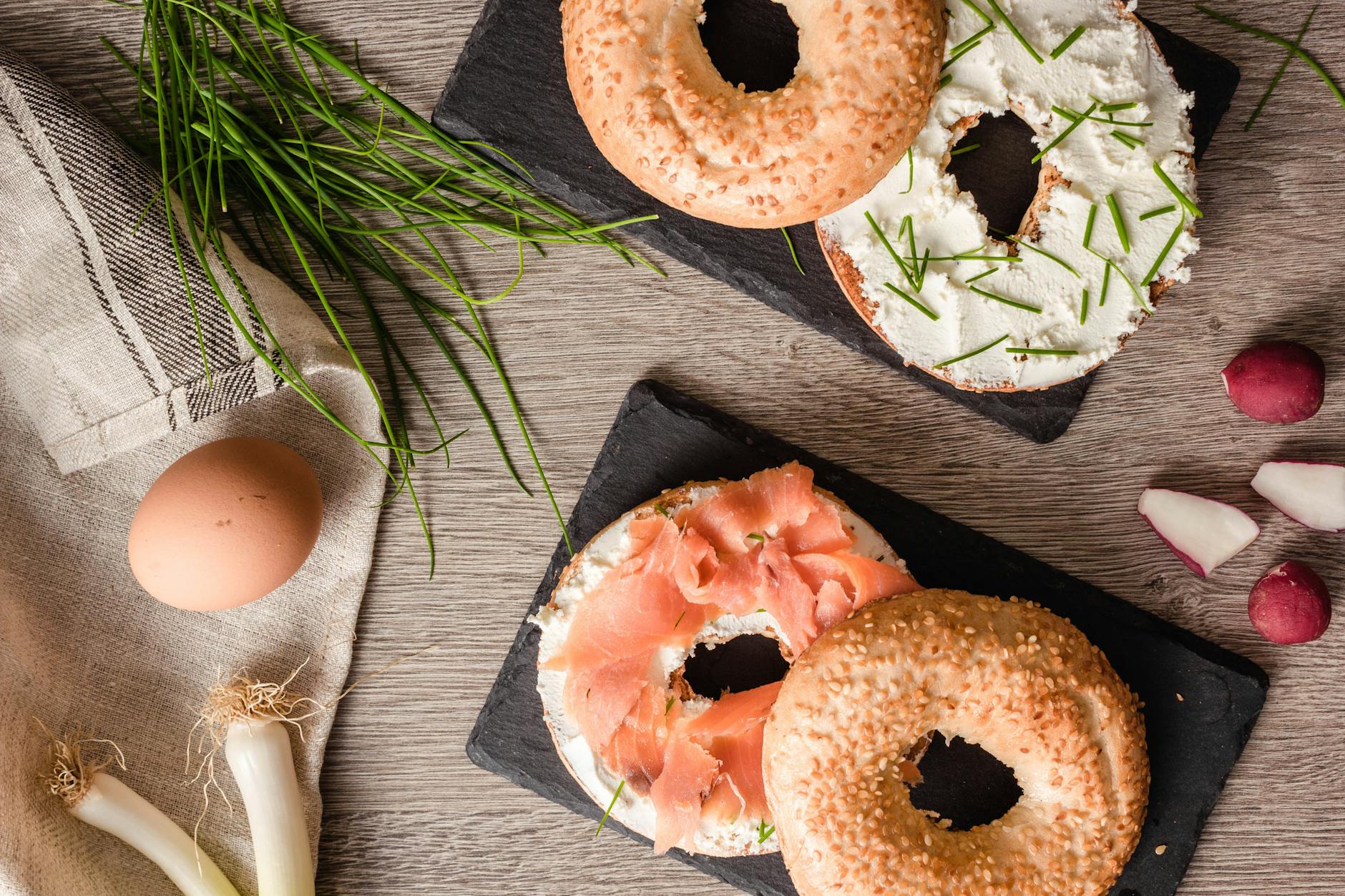 Whipped cheese, silky salmon, and zesty toppings transform morning meals.