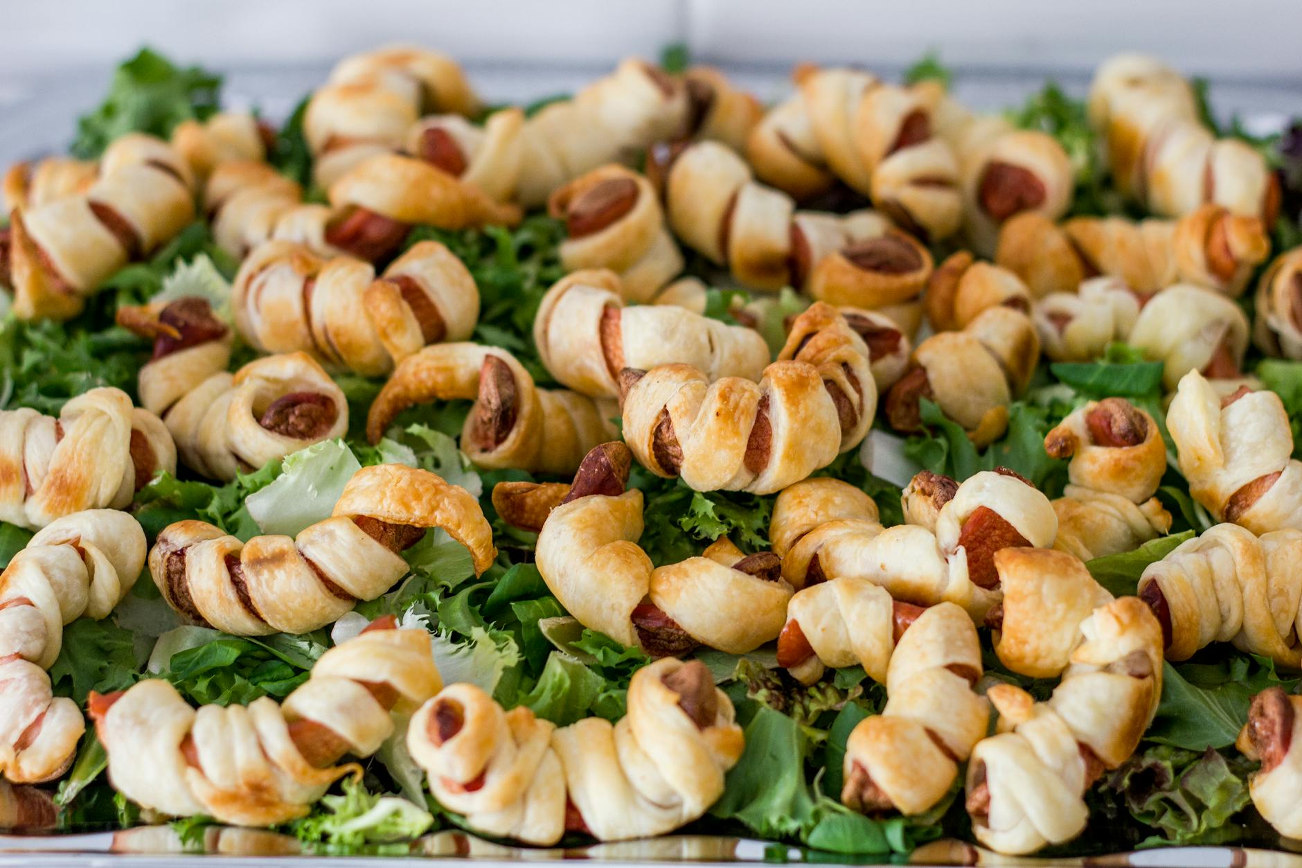 Homemade Pigs in a Blanket: The Ultimate Guide Flaky dough turns mini hot dogs into playful bites with endless flavor twists.