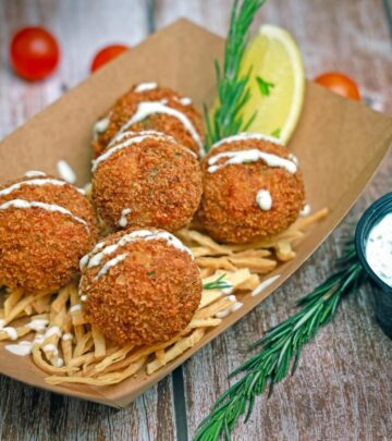 A make-ahead crowd-pleaser that bakes into a gooey, golden dish bursting with savory spice.