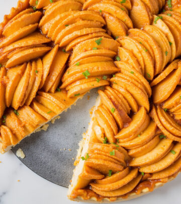 Flaky, buttery crust meets a glossy, caramel-kissed sheen that elevates dessert spreads.