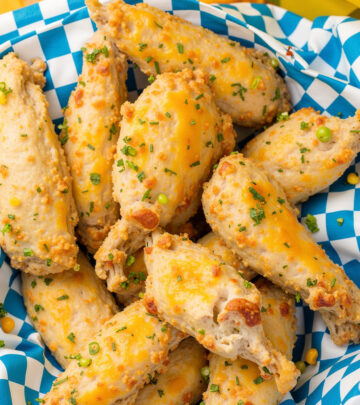 A buttery, cheesy coating transforms chicken pieces into savory crowd-pleasing bites.