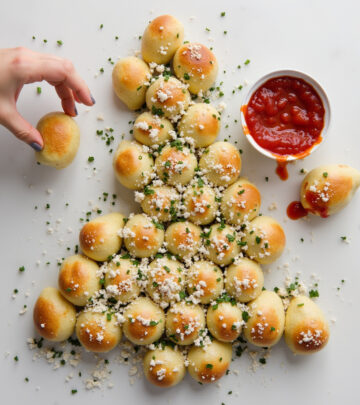 Guests will tear into golden bites brimming with gooey mozzarella and herb butter.